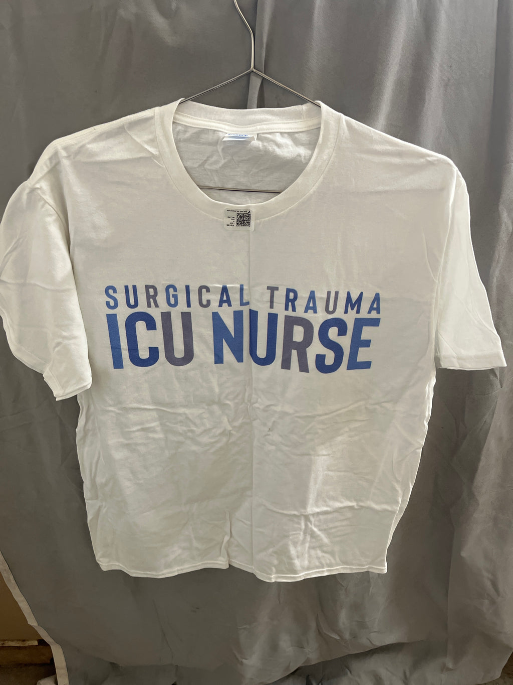 Surgical trauma ICU nurse white Tshirt