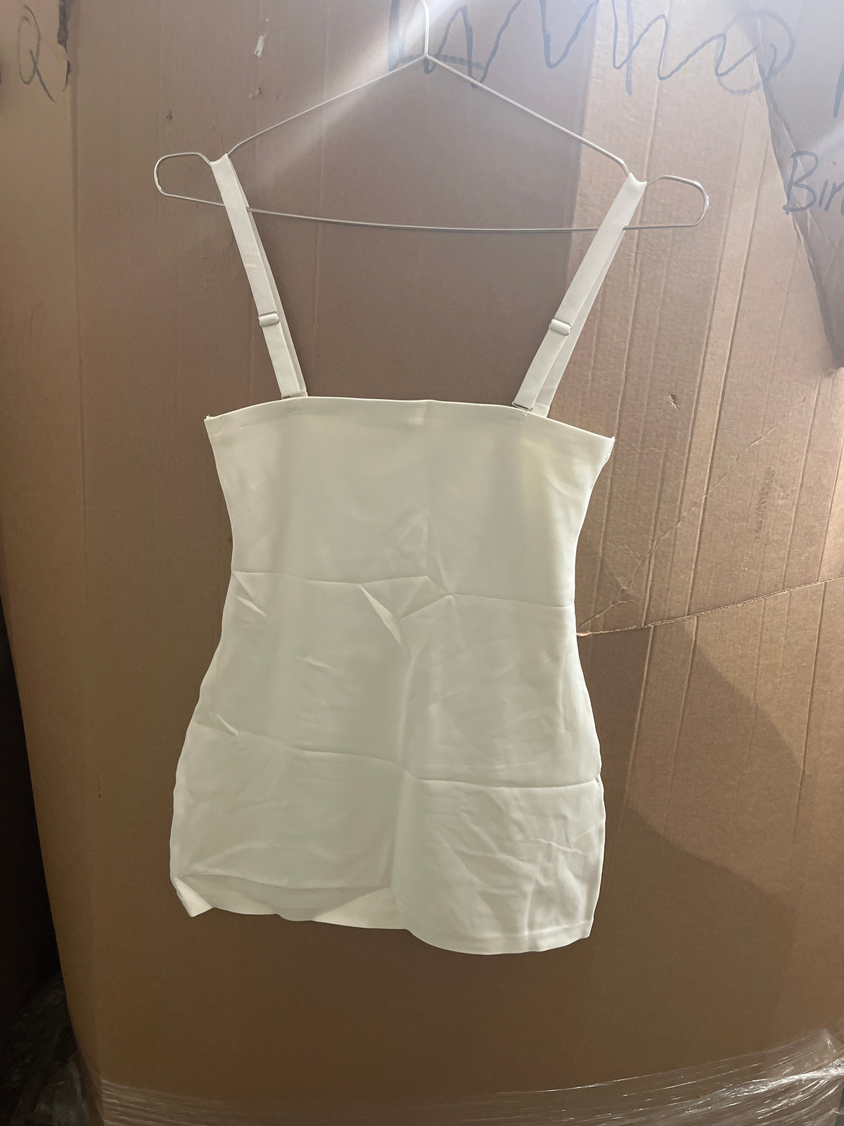 White mini dress with spaghetti straps