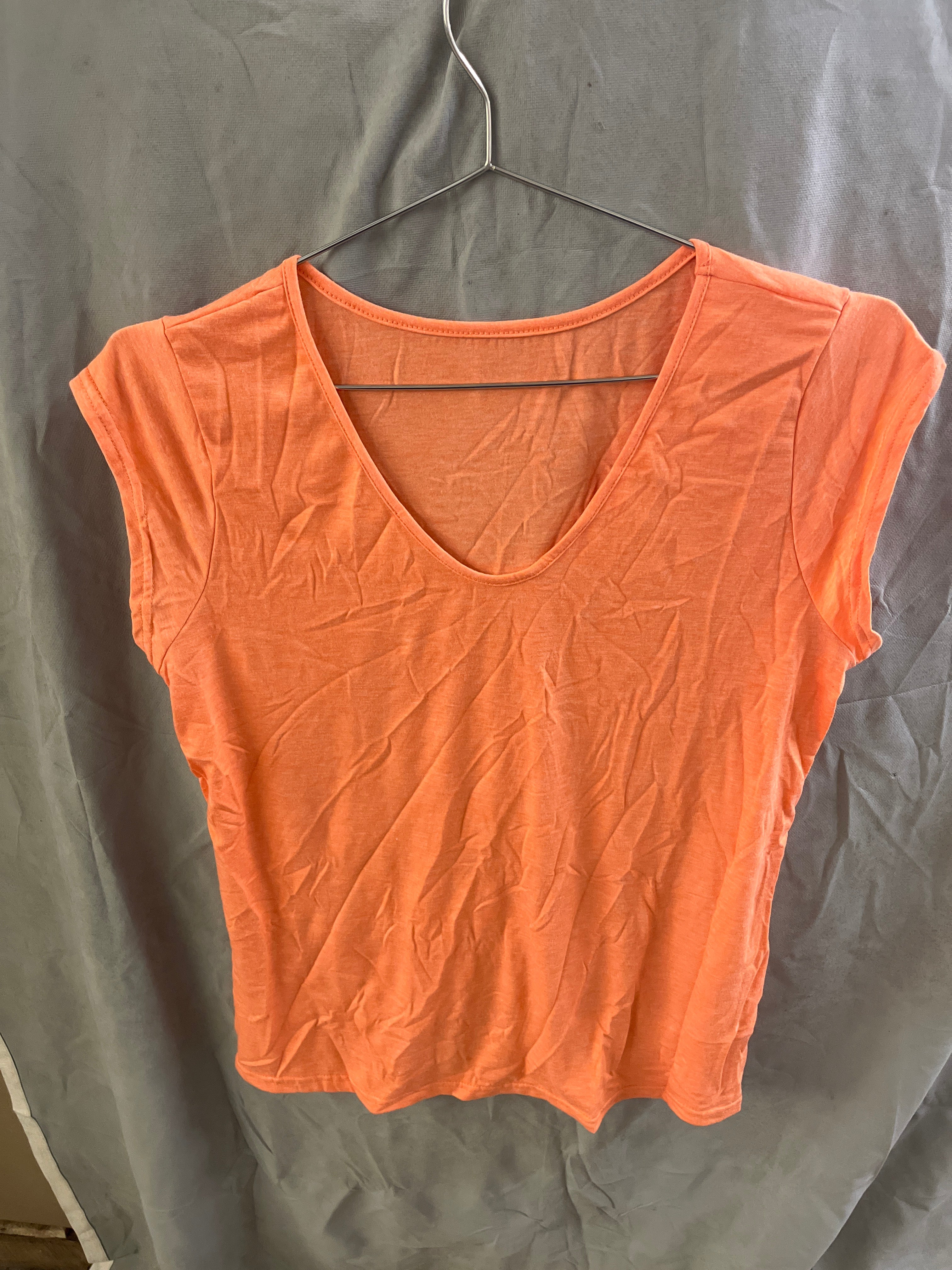 Orange sleeveless shirt