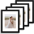 Set Of 4 11x15 inch Picture Frames.