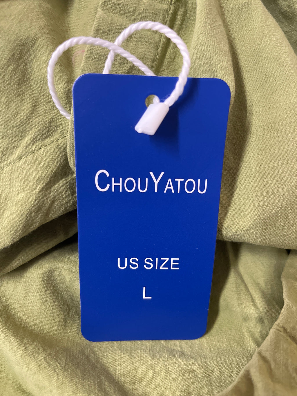 Chou Yatou green blouse
