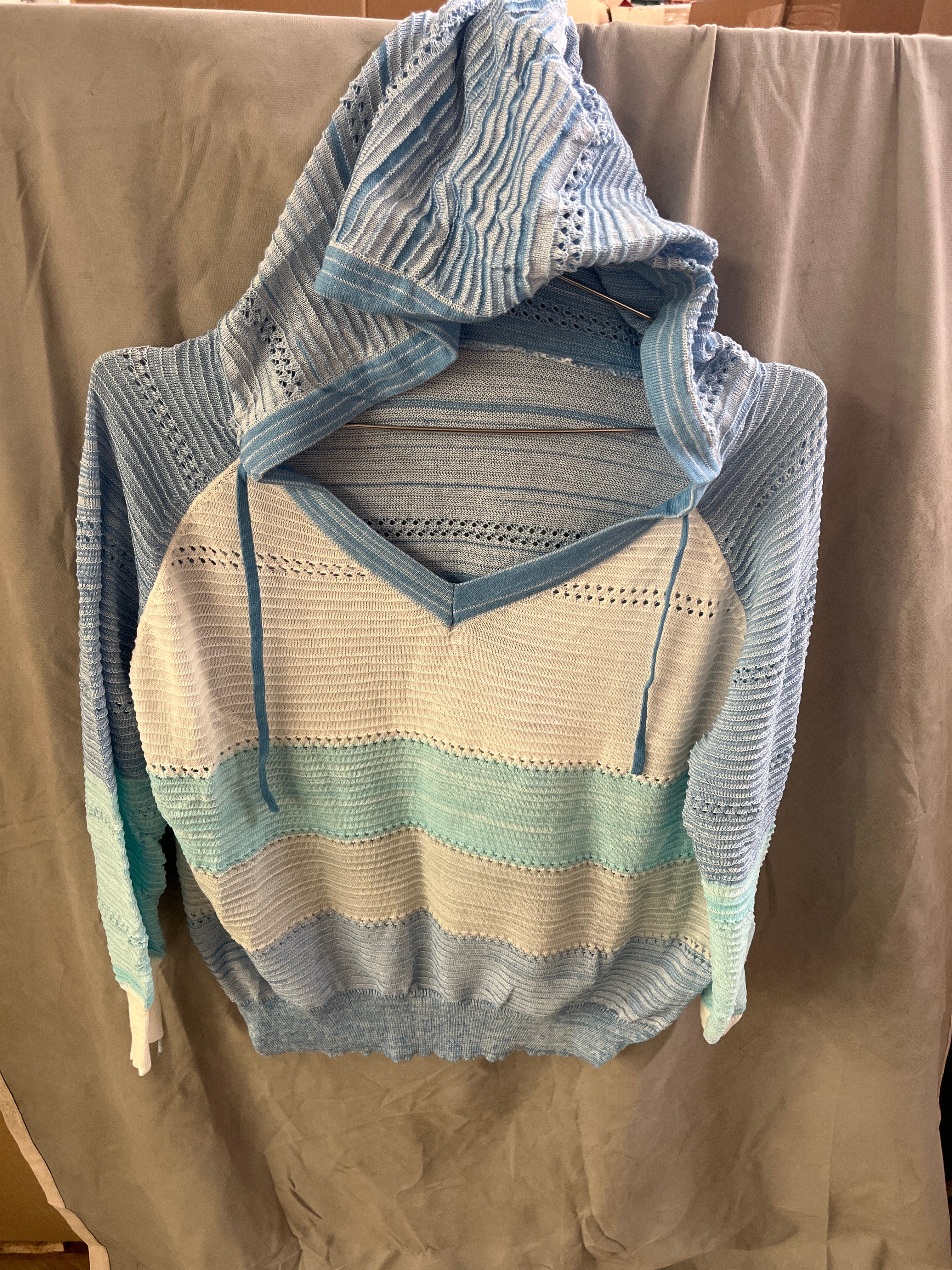 Blue and white sweater