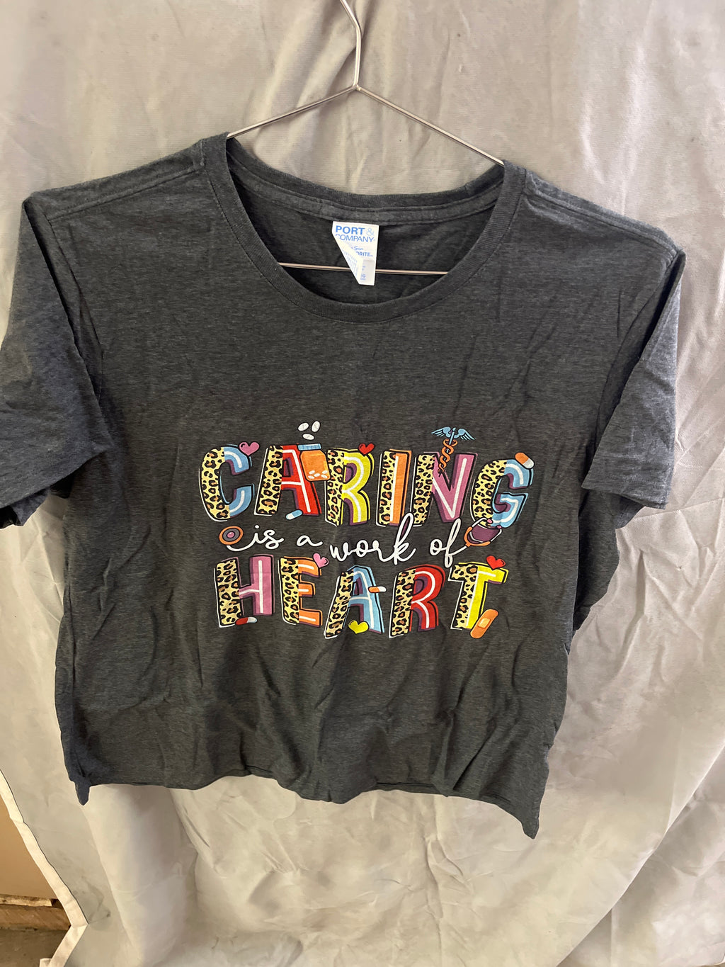 Caring is a work of heart Tshirt
