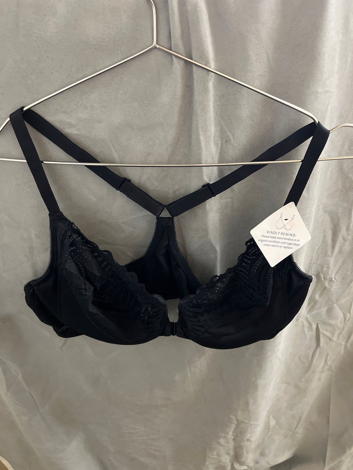 Front closing black lace bra