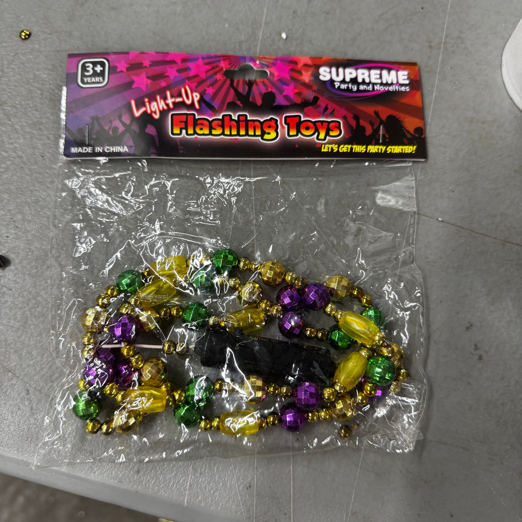 Set of 21 Mardi Gras Light up necklaces.
