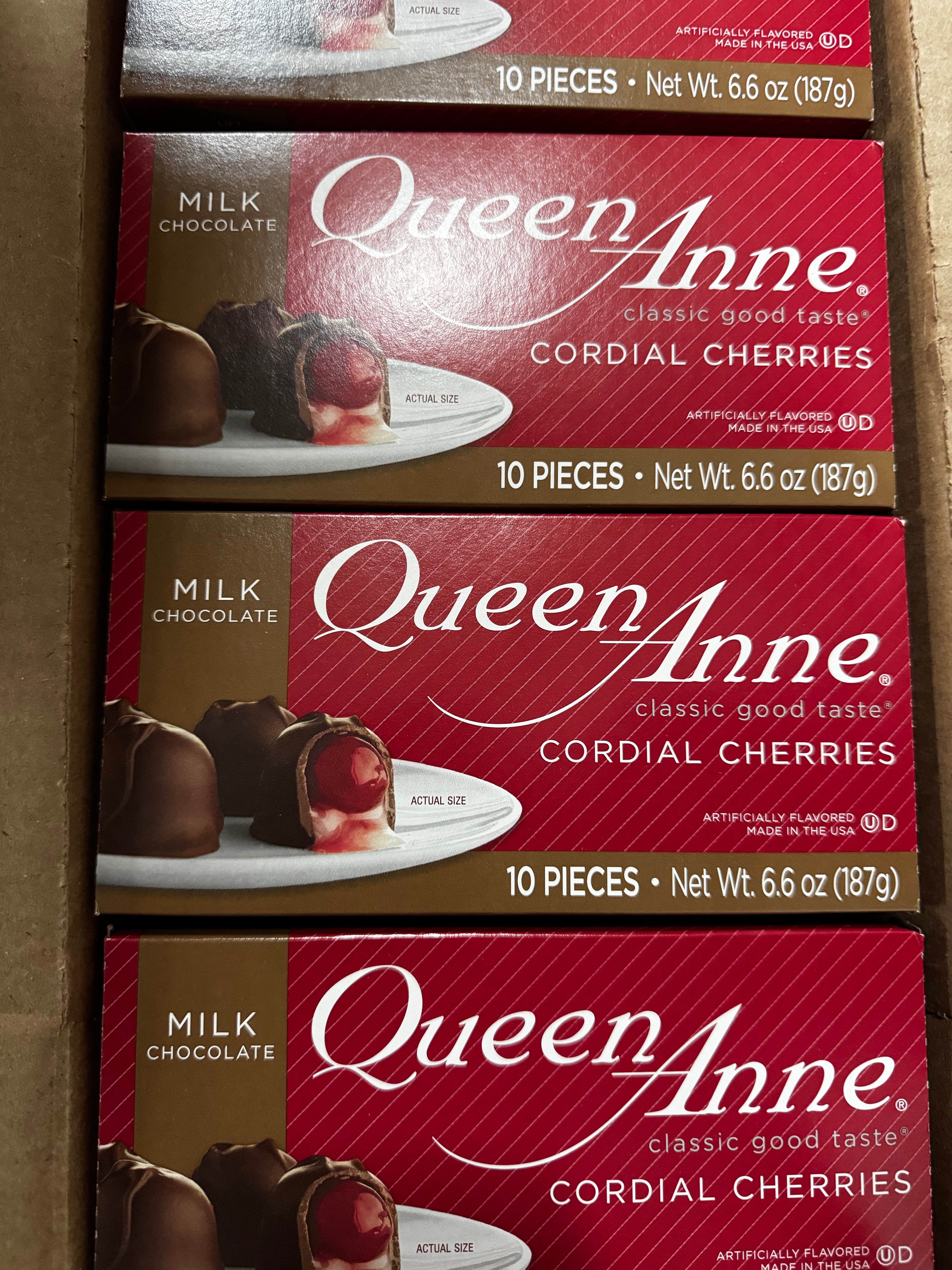 Case of Queen Anne milk, chocolate, cordial cherries. 12 Boxes