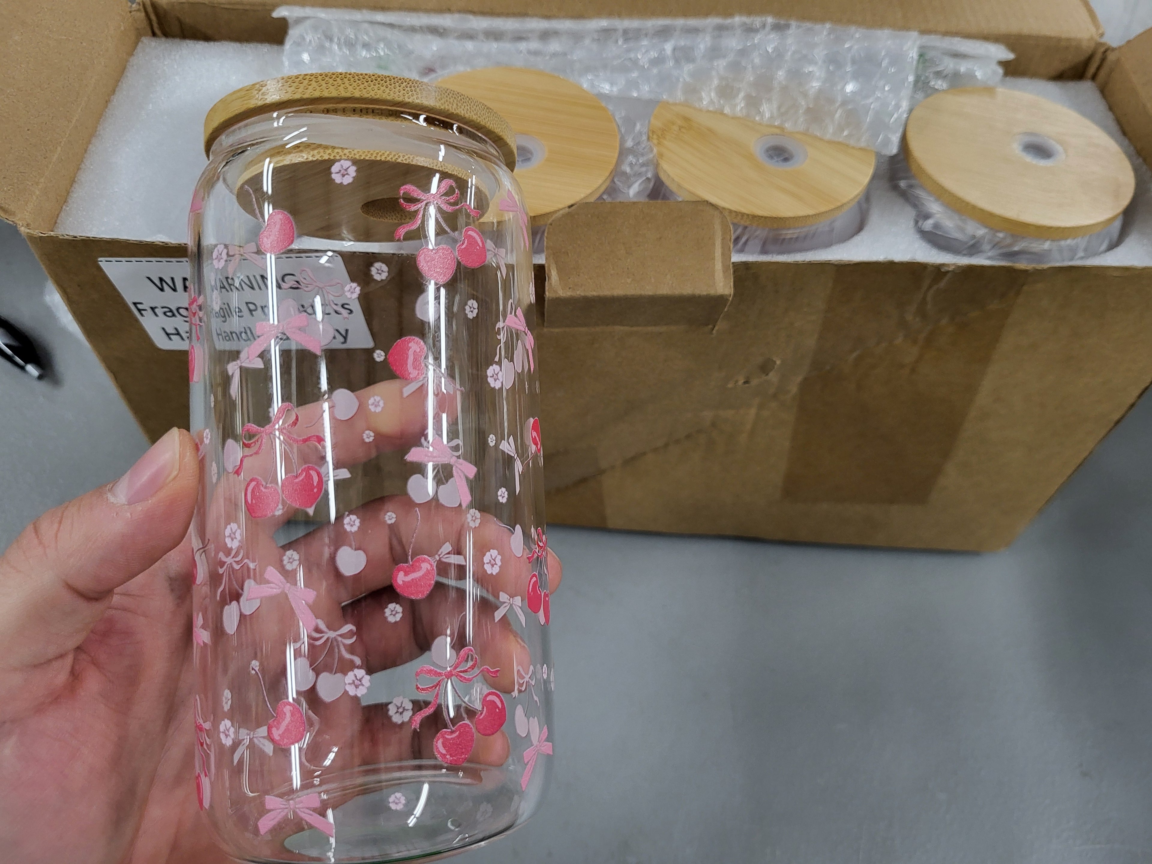 Yetene 4 Set 16 oz Coquette Bows Glass Cups with Lids and Bows Straws Cleaning Brushes Aesthetic Iced Coffee Cup Reusable Mug for Women Sister Birthday Gift Not Dishwasher Safe(Pink,Cherry)