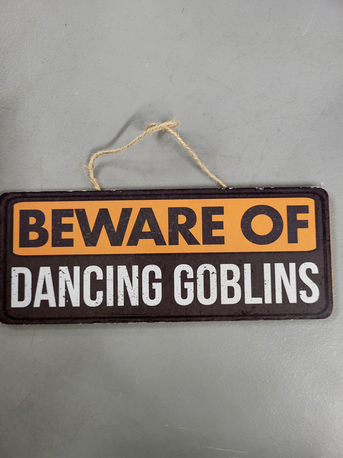 Beware of Dancing Goblins Hanging Sign