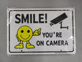 Metal sign "Smile! You're on Camera"