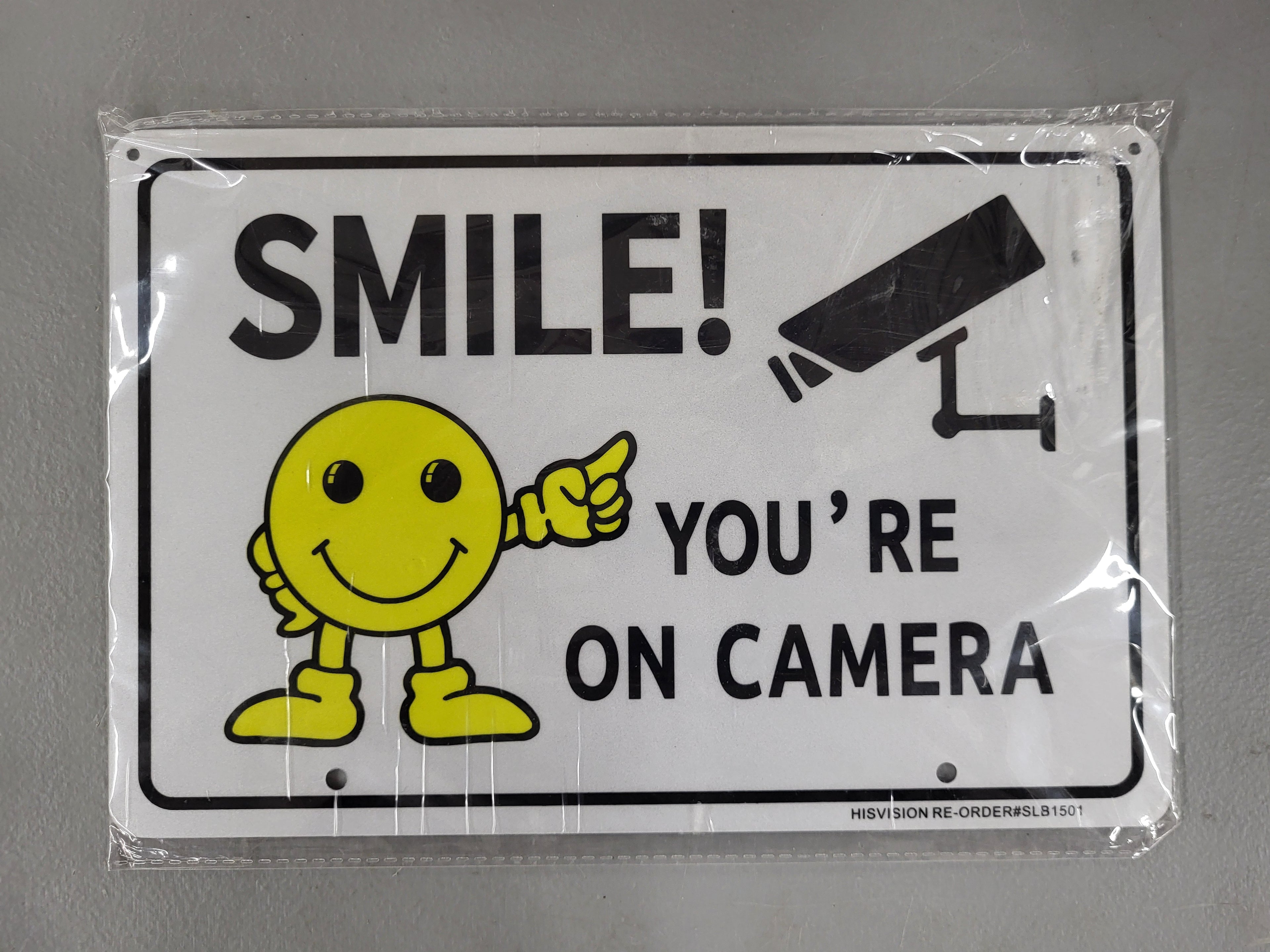 Metal sign "Smile! You're on Camera"